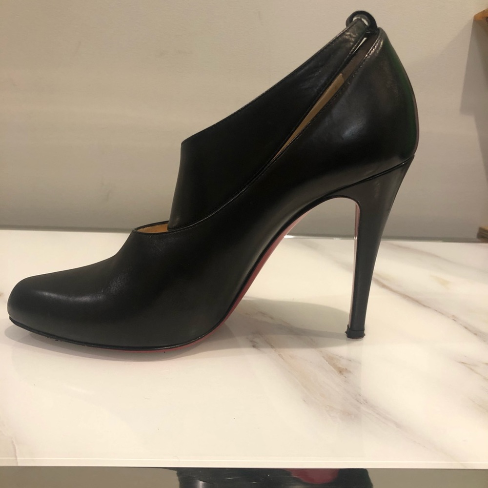 Christian Louboutins black shoes gently worn with box